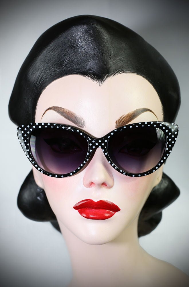 The Kitty sunglasses are black polka dot 50's cats eye sunglasses at Deadly is the Female. Effortlessly add some pinup glamour to your day!