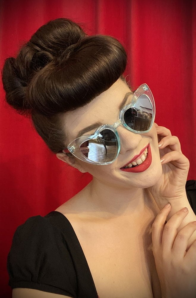 Vintage style Aqua Amore Sunglasses at Deadly is the Female. Effortlessly add some kitsch glamour with these heart shaped sunglasses!