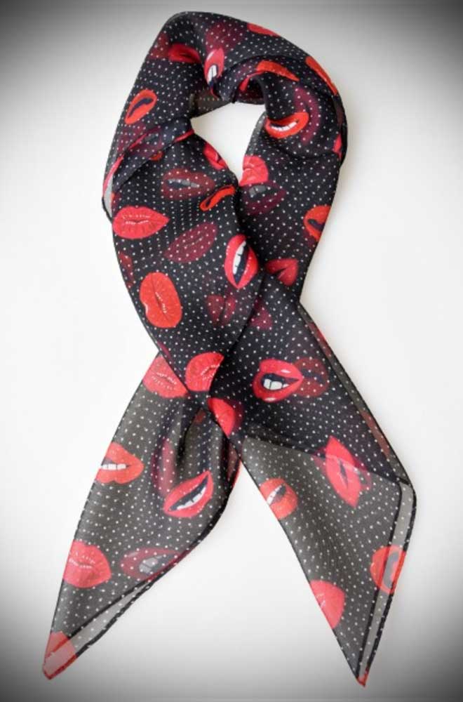 Instant pinup style with this black and white dotted and red lips printed hair scarf! A silky vintage inspired chiffon scarf perfect for tying up and around your divine 'do. Any excuse for a little sky-high hair help!