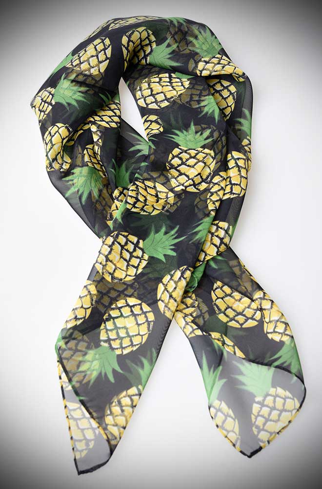 Instant pinup style with this black and juicy pineapple printed hair scarf! A silky vintage inspired chiffon scarf perfect for tying up and around your divine 'do. Any excuse for a little sky-high hair help!