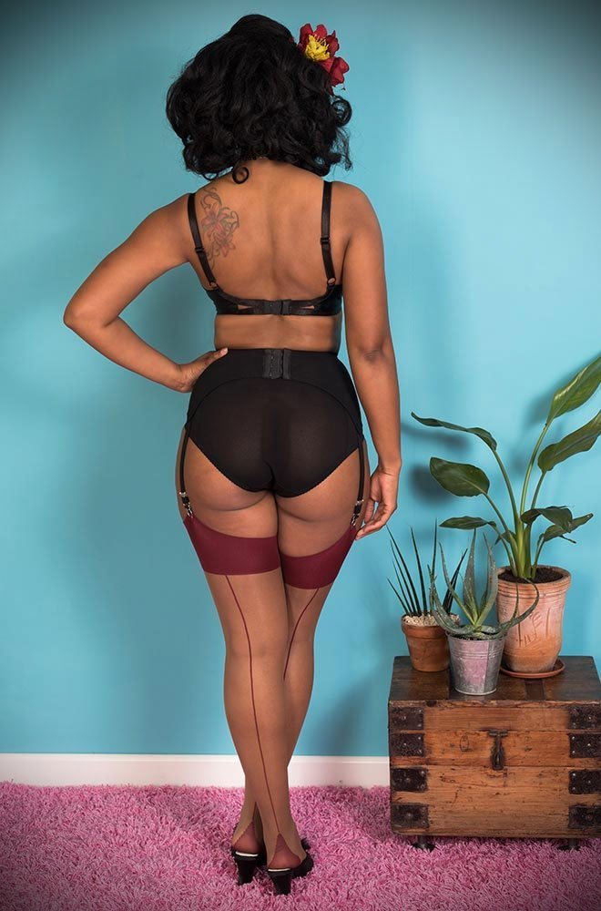 The Nutmeg Claret Seamed stockings are elegant nylons with a deep red wine seam. They add a little bit of glamour to any outfit.