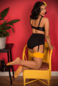 The Mustard Glamour Seamed Stockings are sheer nutmeg nylons with a yellow seam. They add a little bit of glamour to any outfit.