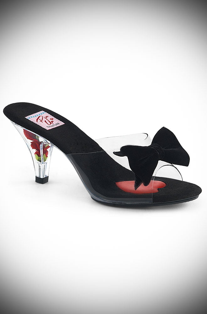 The Pinup Couture Belle Shoes feature a show stopping, vintage style kitten heel. The red rose inside the clear plastic fulfils our Disney princess dreams! This shoe slides on with a clear toe section, just like a fairytale! They also feature an oversized velvet bow and a peep toe.
