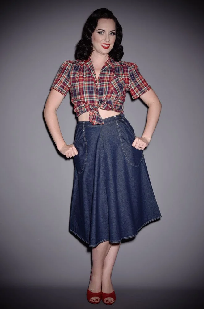 Effortlessly add some vintage style to your everyday look with the blue Denim Jeans Skirt. An authentic reproduction of an original 1950's skirt.