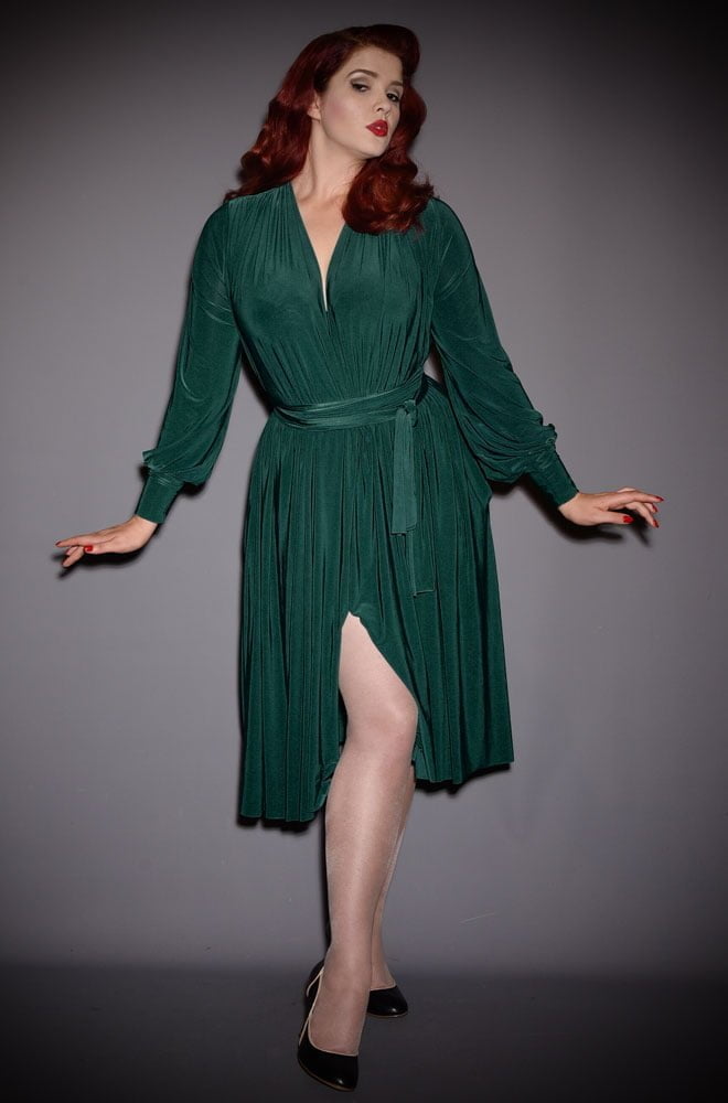 The Green Claudia Dress is a draped jersey dress with sash waist & bishop sleeves. A signature piece by Alexandra King for Deadly is the Female.