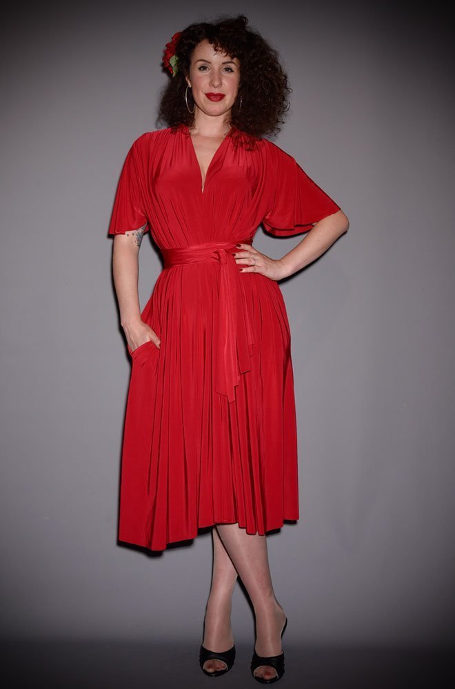 The Red Flutter Sleeve Claudia Dress is a draped jersey dress with sash waist. A signature piece for the Alexandra King for Deadly is the Female Collection.