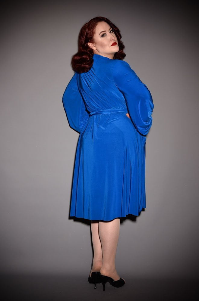 The Royal Blue Claudia Dress is a draped jersey dress with sash waist & bishop sleeves. A signature piece by Alexandra King for Deadly is the Female.
