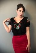 The Vintage Style Black Peasant Blouse is a fantastic summer blouse. Features include a cropped length, shirred neckline & stunning floral embroidery