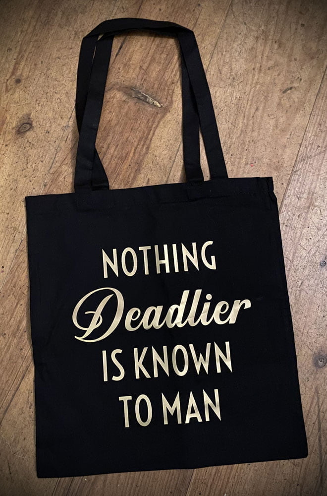 Nothing Deadlier Gold Tote Bag. This classic black tote is chic and sassy all at once. Exclusive and Limited Edition.