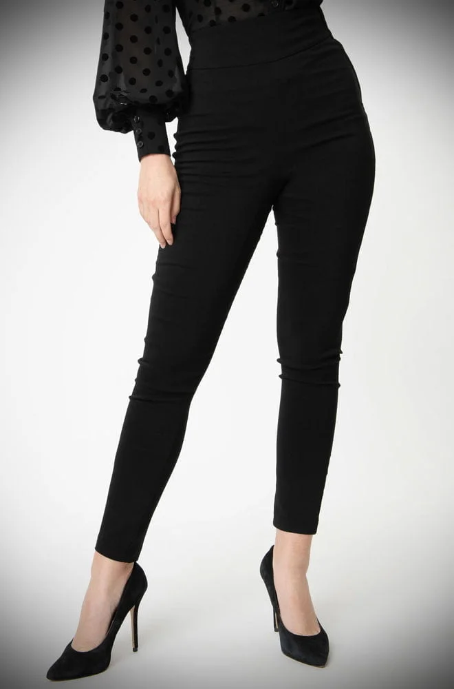 The Rizzo Black Trousers are effortlessly cool! These sassy cigarette pants are ideal to dress up or down! UK stockists of Unique Vintage.