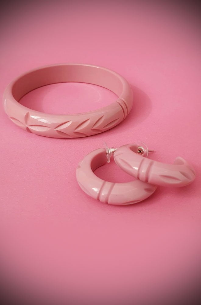Based on vintage designs for an authentic look, the carved fakelite Elsie bangle in Dusty Pink! Coordinating seamlessly with the Elsie hoops.