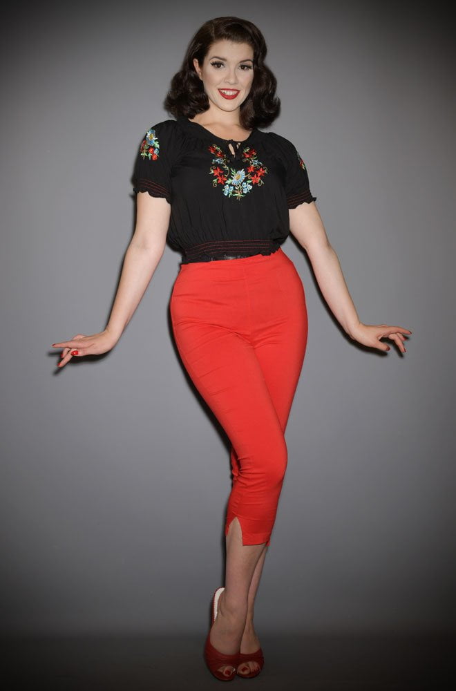 The Red Rachelle Capris are effortlessly cool! These cropped trousers are ideal to dress up or down! UK stockists of Unique Vintage.