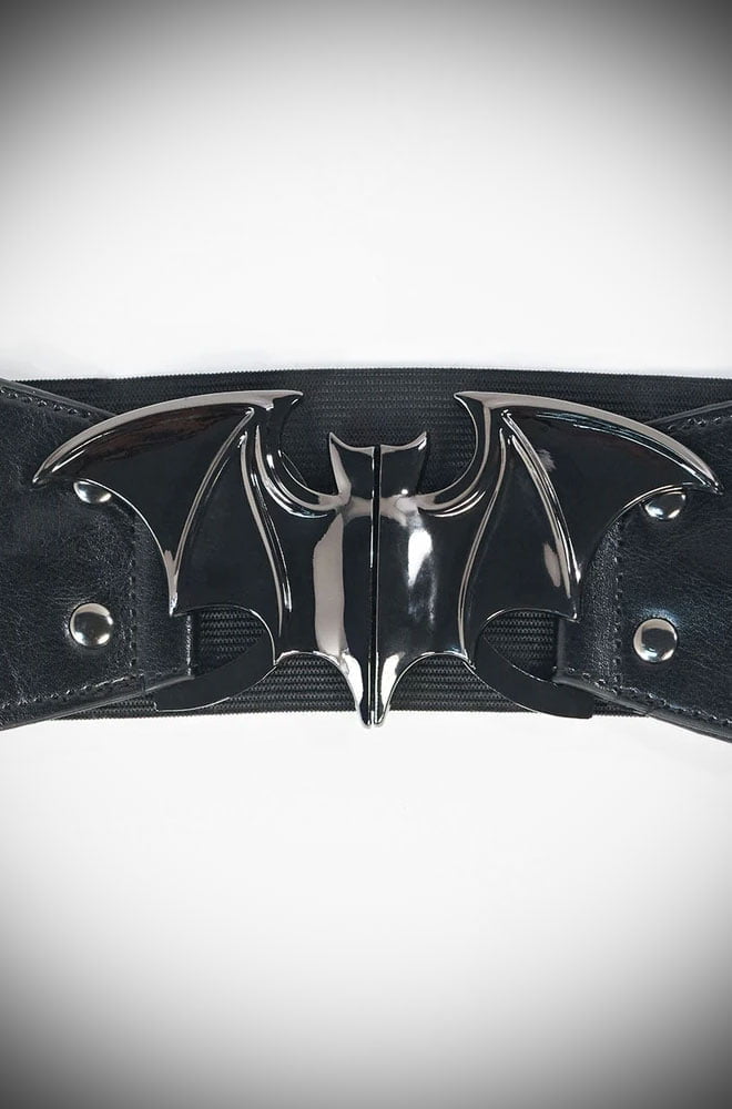 The Bat Cinch Belt is a sassy wardrobe essential! Throw it on to instantly cinch in your waist in spooky style! Unique Vintage UK stockists.