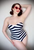 Barbie Swimsuit is a vintage dream - this is a life-sized reproduction of Barbie’s original 1959 Black & White Stripe Bathing Suit!