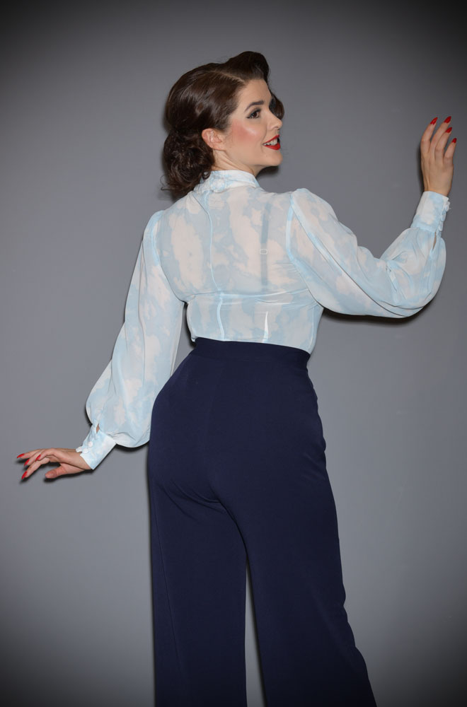 The Cloud Print Gwen Blouse is a vintage-inspired ethereal pussy bow blouse by Unique Vintage at UK stockists, Deadly is the Female.