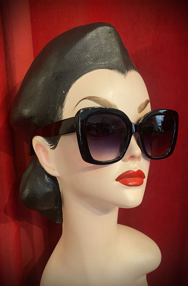 Vintage-style Black Twiggy sunglasses at Deadly is the Female. Effortlessly add some pinup glamour to your day!