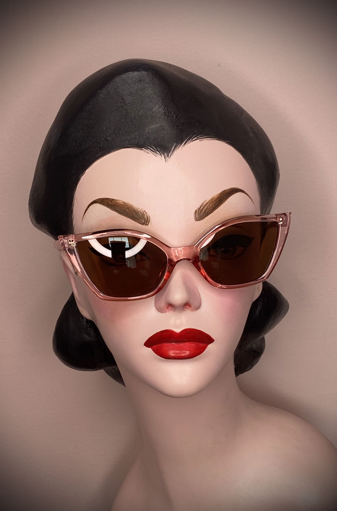 Vintage-style Pink Harper Sunglasses at Deadly is the Female. Effortlessly add some sassy, pinup glamour to your day!
