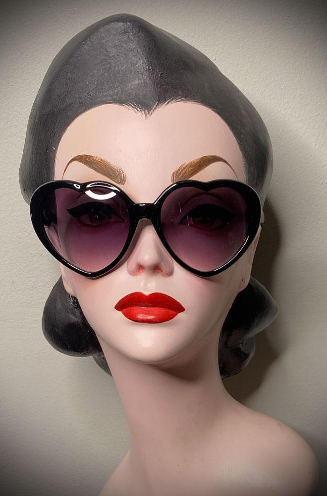 Vintage-style Black Heart Eyes sunglasses at Deadly is the Female. Effortlessly add some pinup glamour to your day!