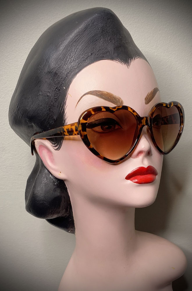 Vintage-style Tortoiseshell Heart Eyes sunglasses at Deadly is the Female. Effortlessly add some pinup glamour to your day!