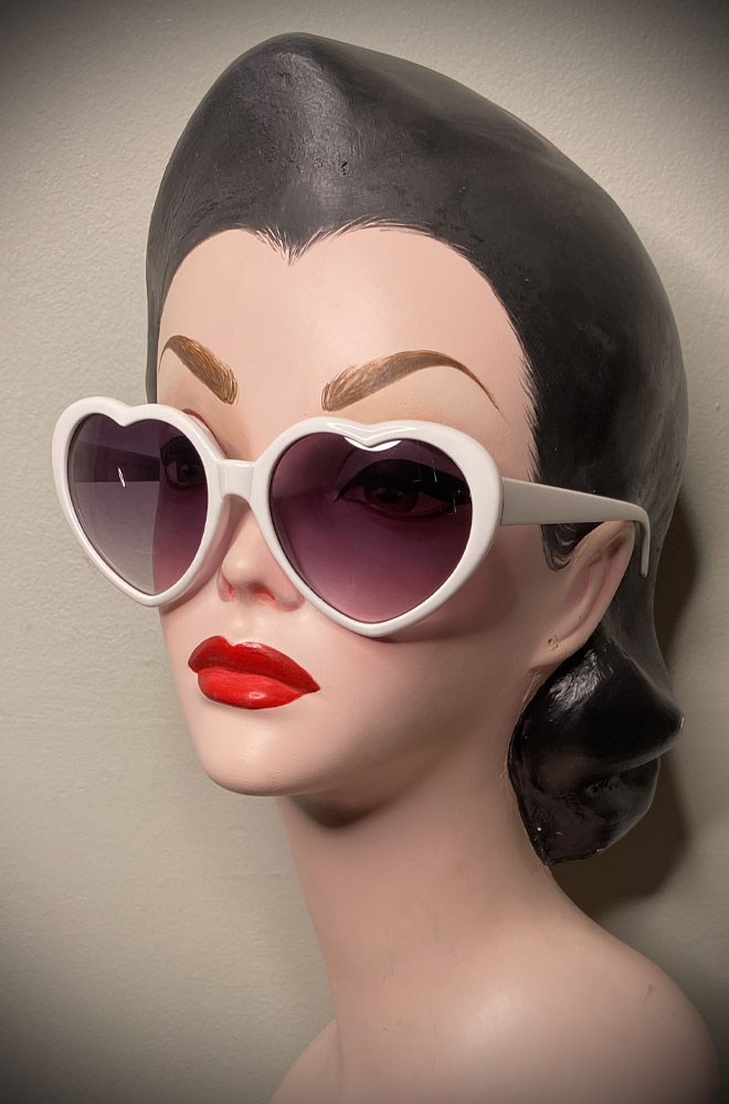 Vintage-style White Heart Eyes sunglasses at Deadly is the Female. Effortlessly add some pinup glamour to your day!