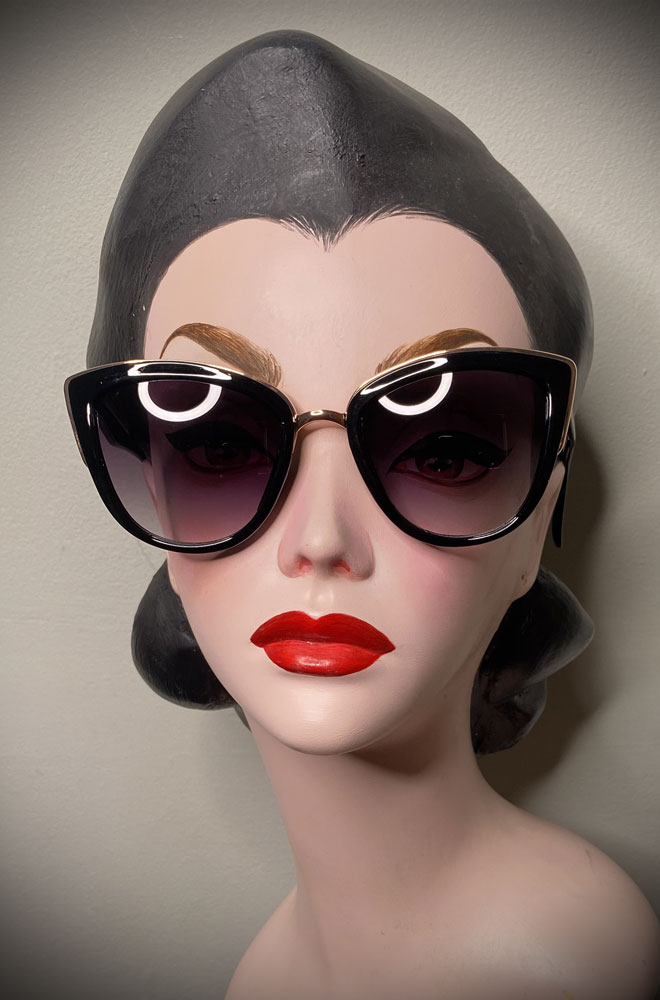 Vintage-style Black Kennedy Sunglasses at Deadly is the Female. Effortlessly add some pinup glamour to your day!