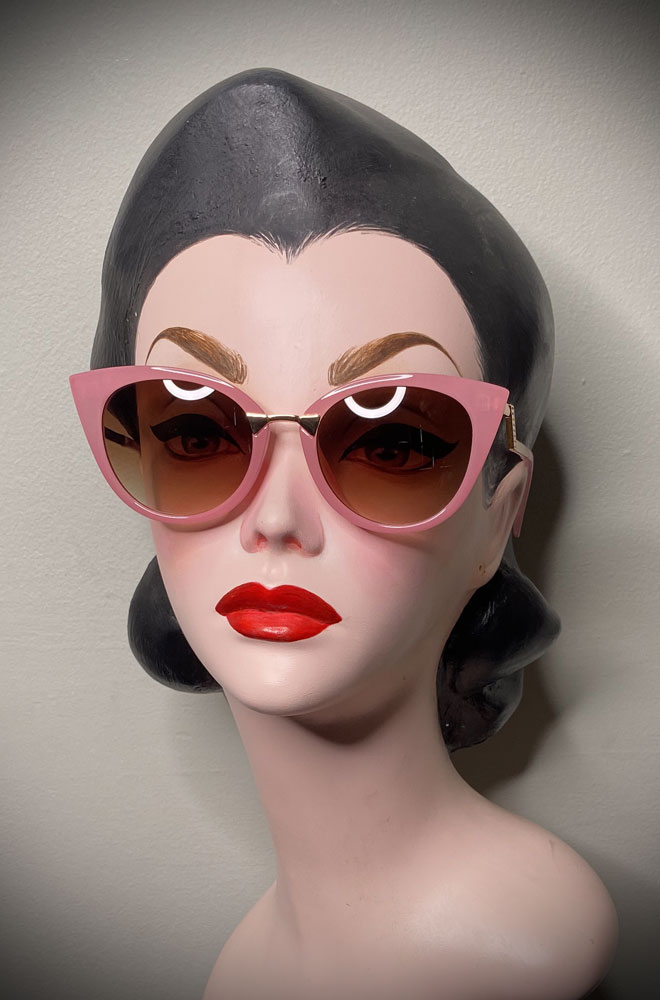 Vintage-style Pink Rita sunglasses at Deadly is the Female. Effortlessly add some sassy, pinup glamour to your day!