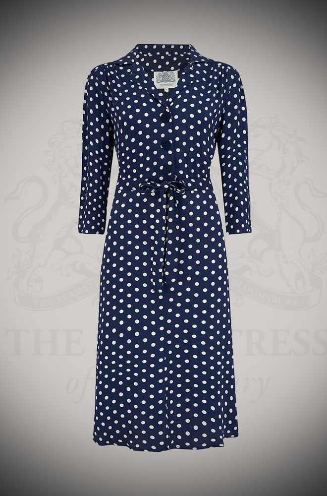 The Polka Dot Milly Dress is a classic 40s style dress in timeless polka dots. Elegant & chic, this understated dress also has a sultry feel