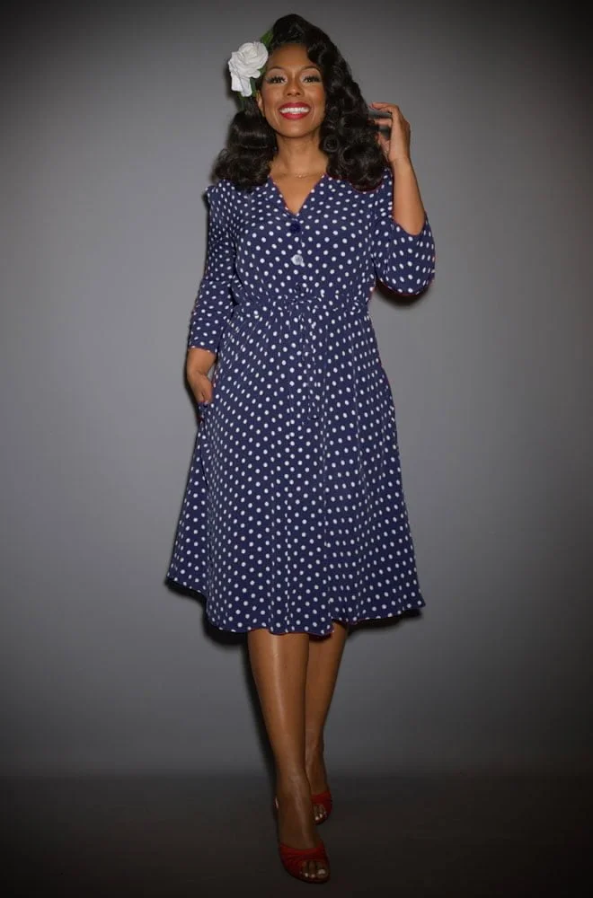 The Polka Dot Milly Dress is a classic 40s style dress in timeless polka dots. Elegant & chic, this understated dress also has a sultry feel