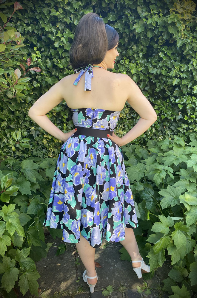 Lilac Floral Swing Dress - a beautiful 50s style halter dress with pockets. Deadly is the Female are official stockists of Unique Vintage.