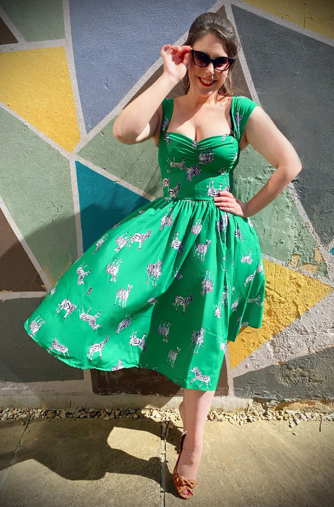 Zebra Swing Dress - a beautiful green 50s style dress with pockets. Deadly is the Female are official stockists of Unique Vintage.
