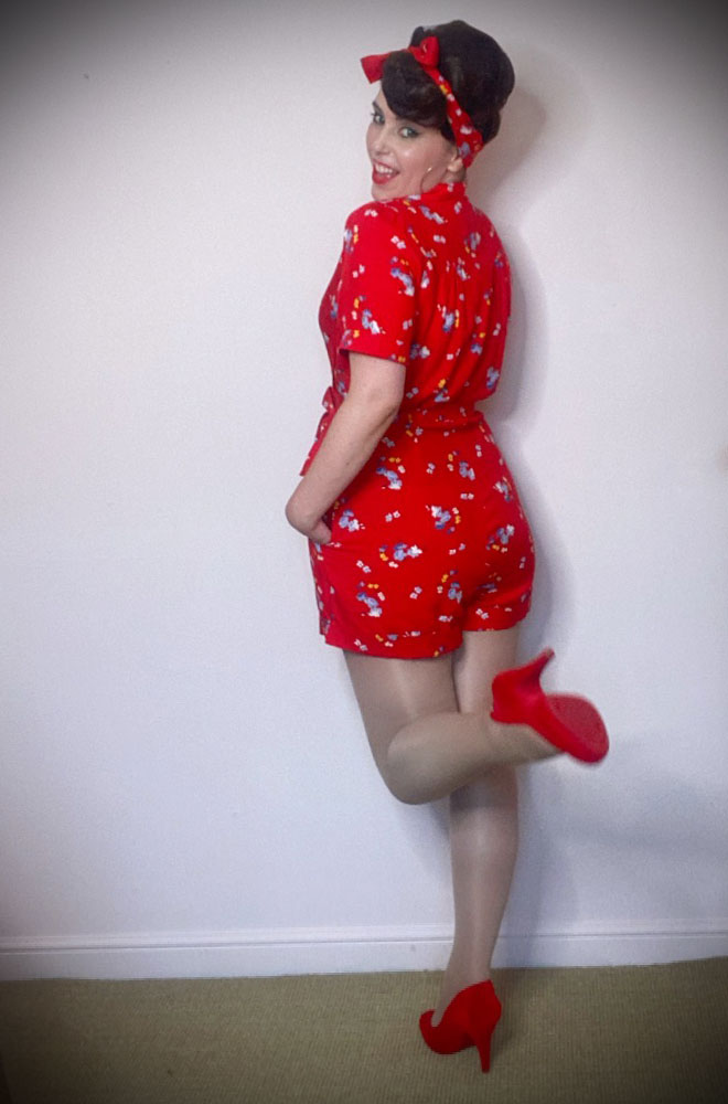 Red Floral Playsuit - a timeless 1940s-inspired romper in an authentic red floral print at DeadlyistheFemale.com. Perfect for pinup girls