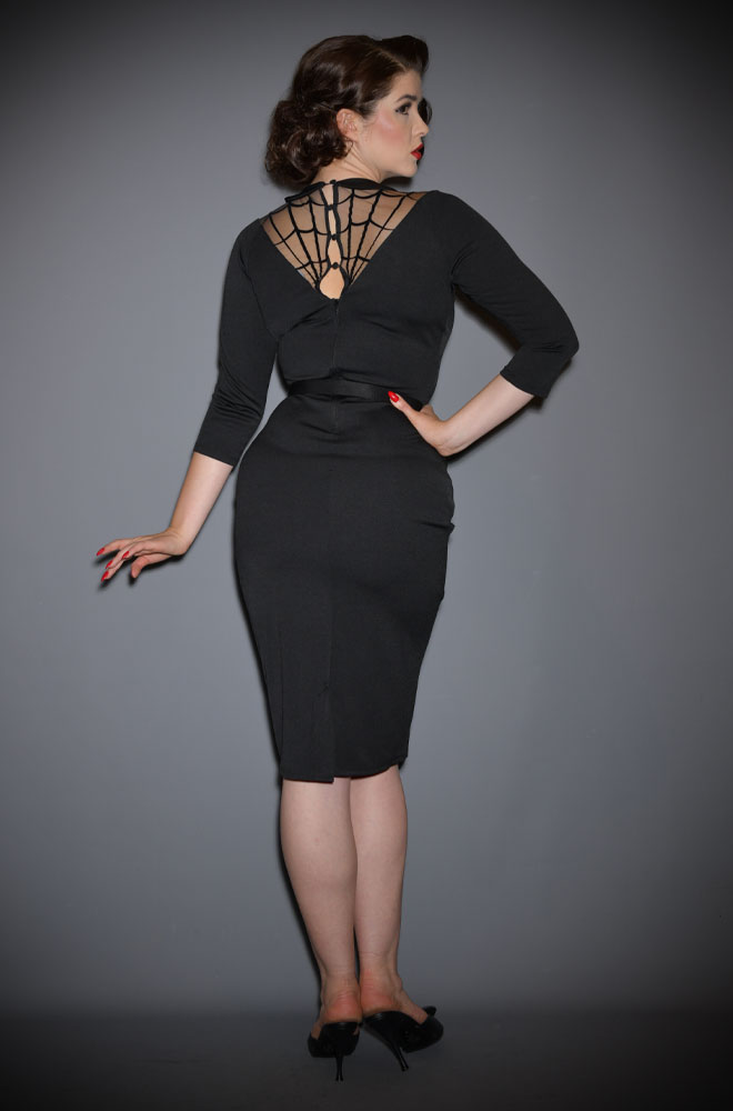 Morgana Spiderweb Dress - Perfectly blends spooky style with vintage charm, it is utterly bewitching. Deadly are official stockists of Unique Vintage.