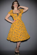 Marigold Swing Dress - a beautiful butterfly print 50s style dress, with pockets! Deadly is the Female are official stockists of Unique Vintage.