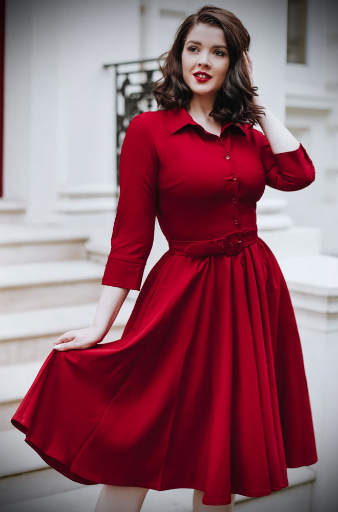 The Agnes Swing Dress is a beautiful fit and flare dress, in a striking shade of berry red. Pair with a fitted cardigan and boots in colder months.