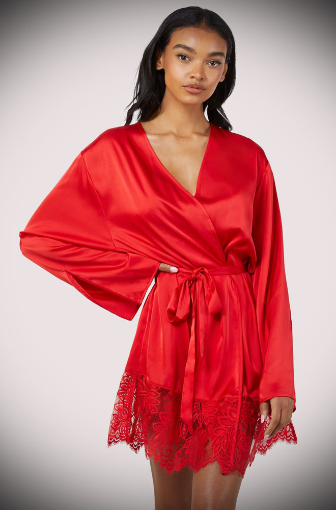 This Rosie Red Satin Robe is finished with a deep floral lace edging and a tie waist. The ultra-smooth satin gently skims your skin.