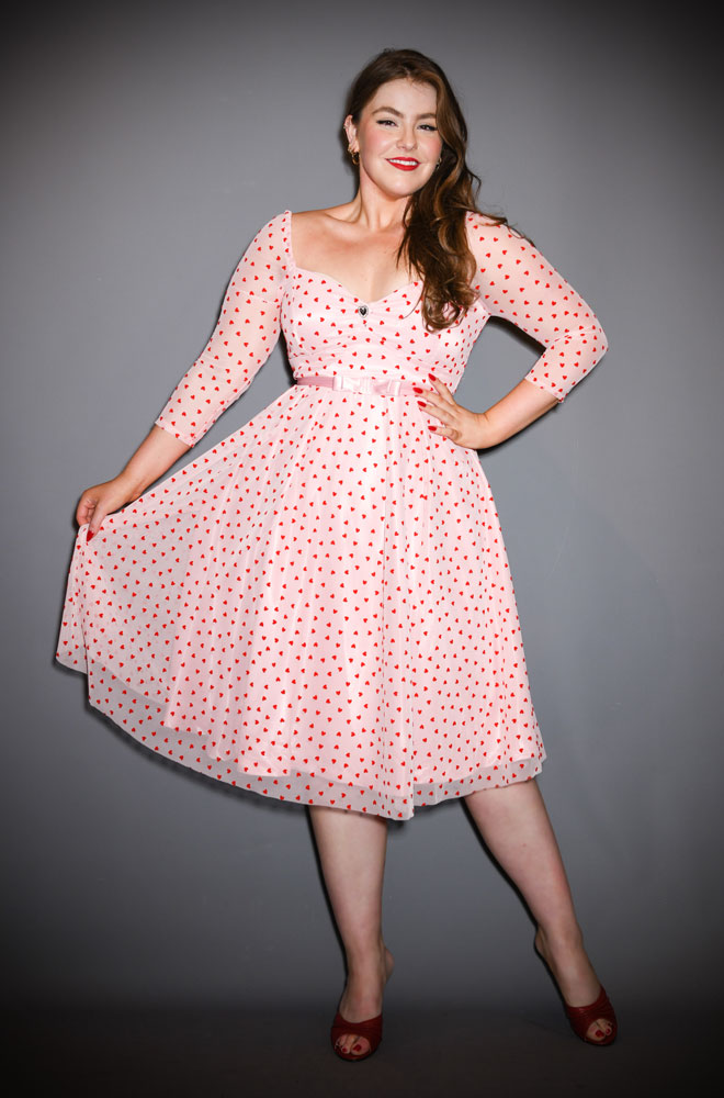 L'amore Swing Dress - a pink and red hearts 50s style swing dress. Deadly is the Female are official UK stockist of Unique Vintage.