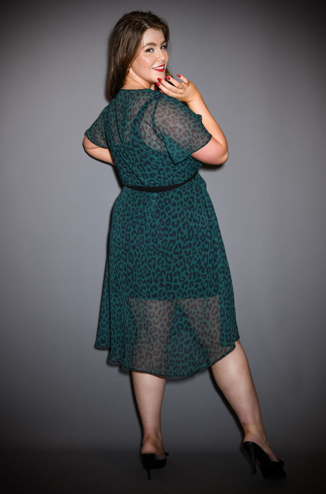 Green Leopard Flutter Sleeve Claudia Dress - a one Size fits most draped dress. A signature piece for the Alexandra King for Deadly is the Female Collection