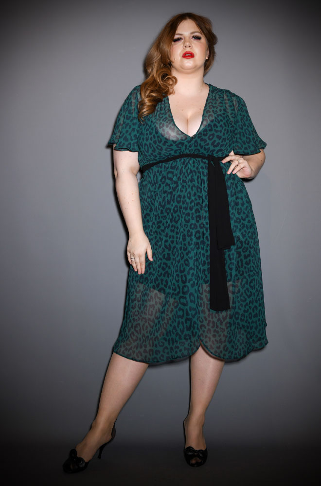 Green Leopard Flutter Sleeve Claudia Dress - a one Size fits most draped dress. A signature piece for the Alexandra King for Deadly is the Female Collection