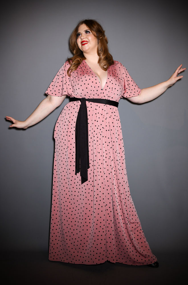 The Pink Polka Flutter Sleeve Claudia Gown - One Size fits most draped maxi dress. A signature piece for the Alexandra King for Deadly is the Female