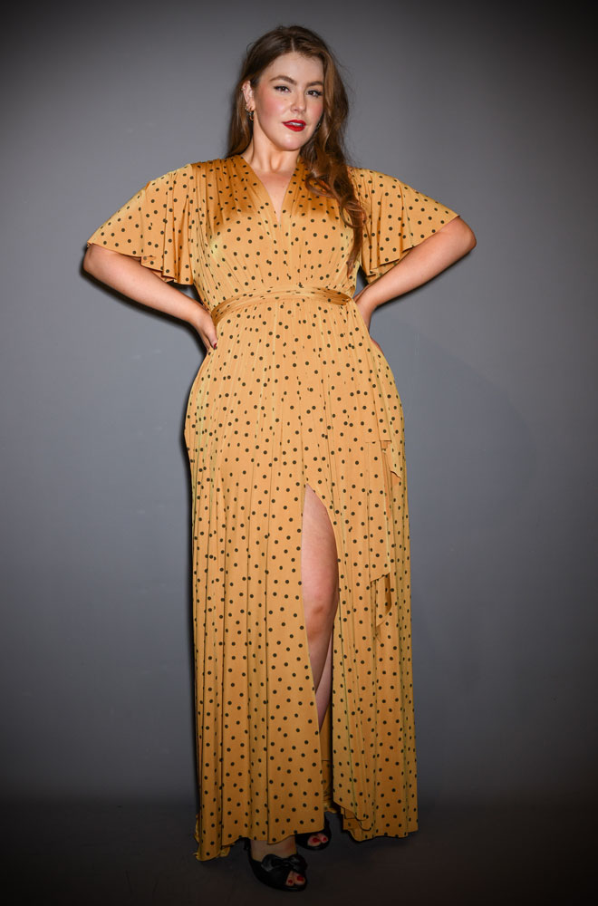 The Yellow Polka Flutter Sleeve Claudia Gown - One Size fits most draped maxi dress. A signature piece for the Alexandra King for Deadly is the Female