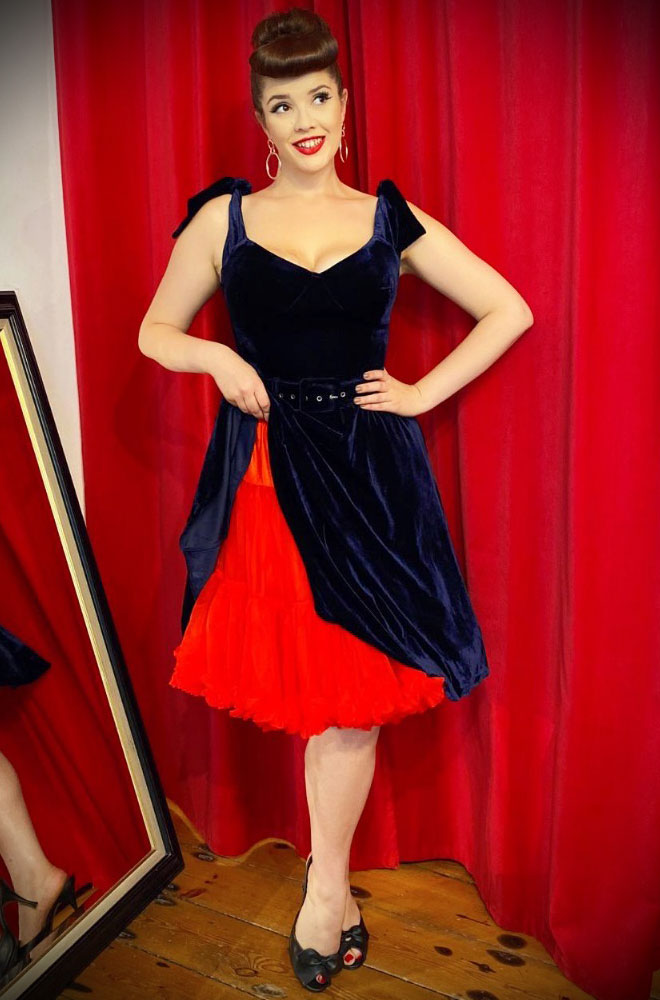 This vintage 1950s-style Red Starlet Petticoat is soft & comfortable under your favourite swing dress or circle skirt. 23" long.
