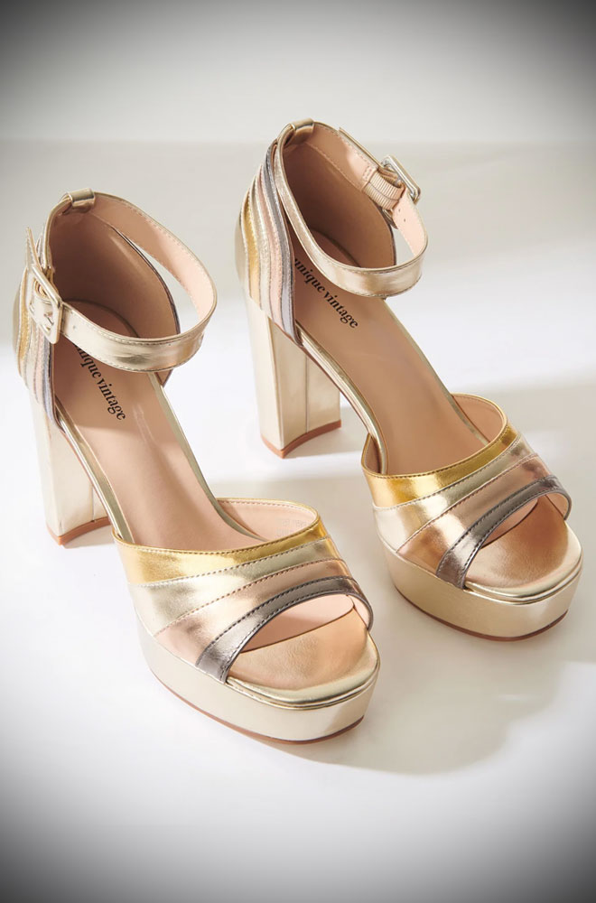 Metallic Platforms feature a peep toe, an adjustable ankle strap, and a cushioned sole. The gold, bronze, and copper leatherette is to die for!