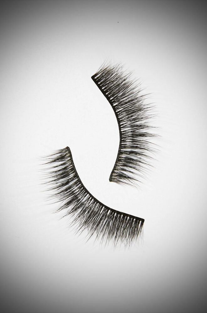 Titter Fluttery False Lashes by Bettie Page Beauty - luxe synthetic lashes. Vegan-friendly with a fine black cotton band. EU/FDA approved adhesive.