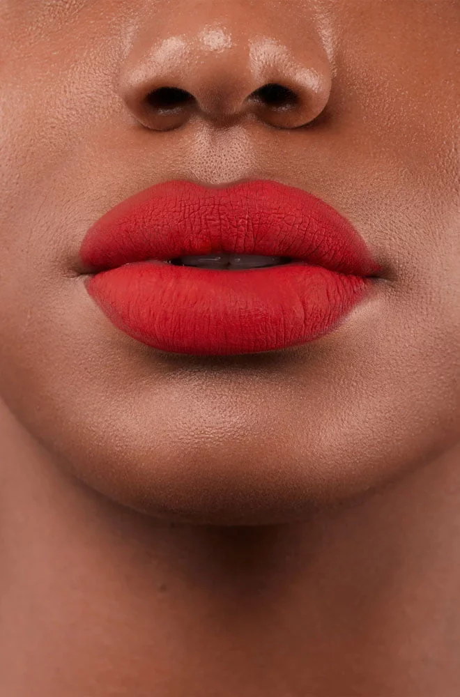 Bright Red Notorious Matte Liquid Lipstick - long-lasting, transfer-resistant lipstick infused with cocoa butter and beeswax. Cruelty-free.