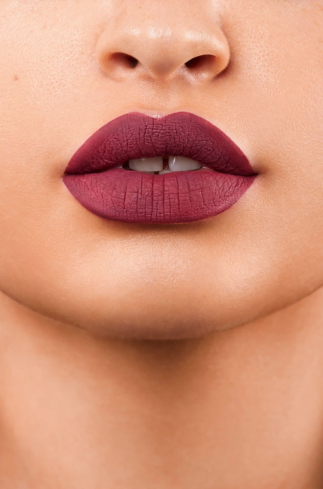 Dark Berry Red Klaw Matte Liquid Lipstick - long-lasting, transfer-resistant lipstick infused with cocoa butter and beeswax. Cruelty-free.