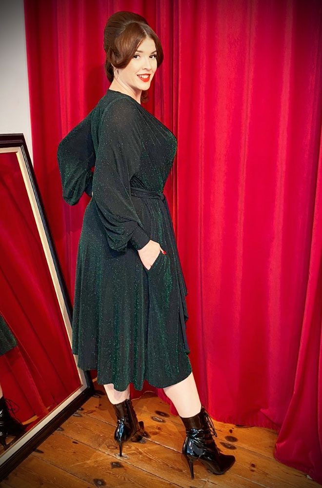 The Green Sparkle Claudia Dress is a vintage-style draped lurex dress with a sash waist. A signature piece by Alexandra King for Deadly is the Female.