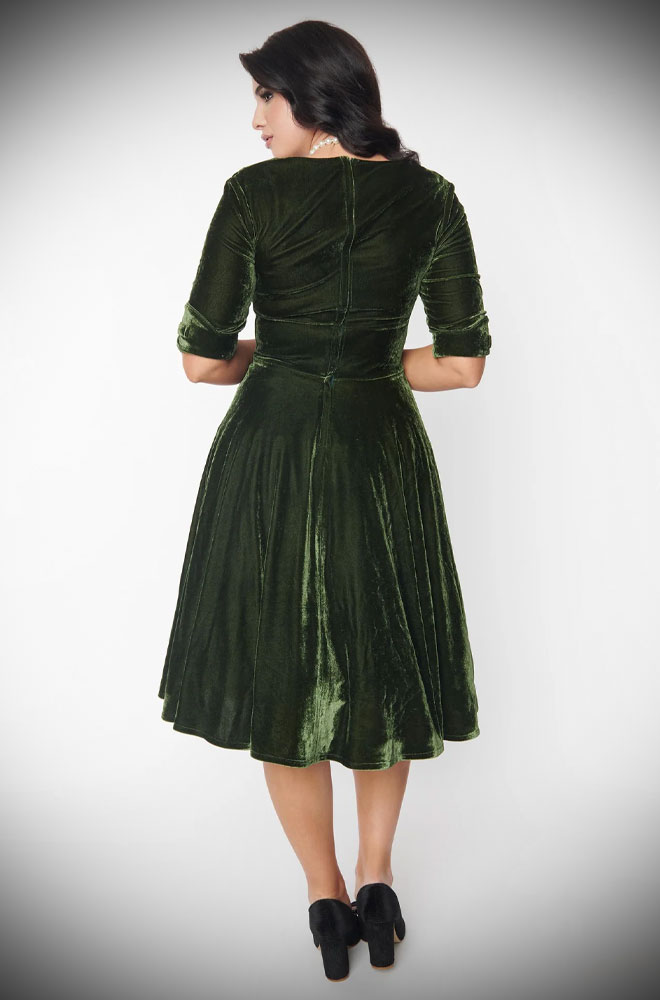 The Olive Velvet Delores Dress is an effortlessly elegant 50s-style dress. Deadly is the Female are UK stockists of Unique Vintage.