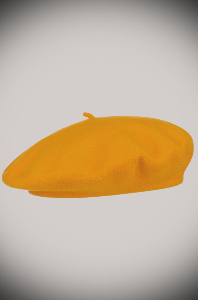 The Mustard 40s Beret is a timeless accessory! These can be paired with any outfit from day wear to evening. 100% wool and one size fits most.