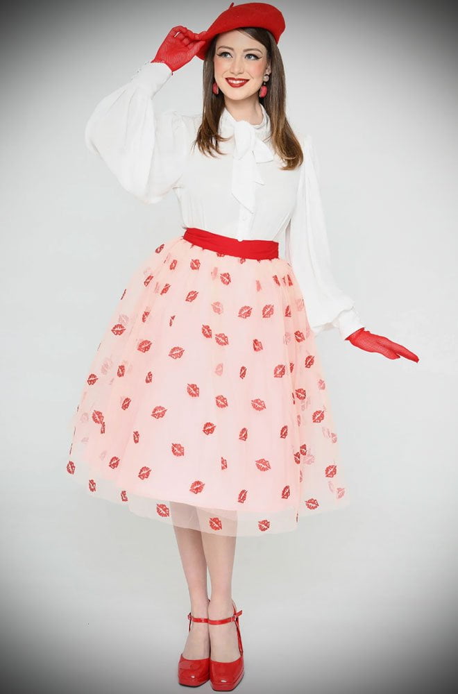 The Glitter Lips Swing Skirt is a delightful 1950s-style full skirt, covered in kisses! We are UK stockists of Unique Vintage.