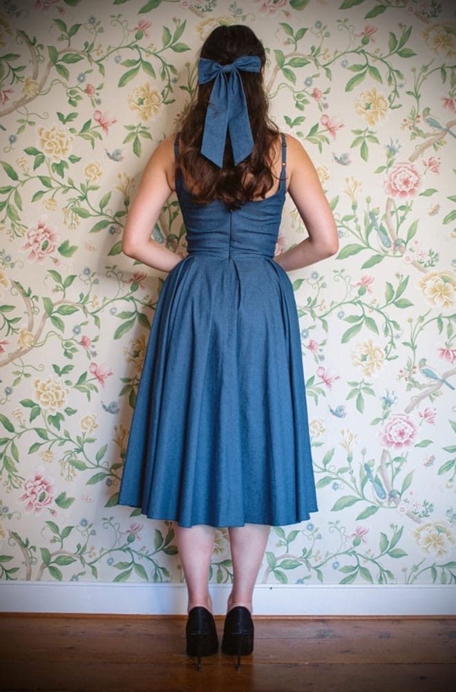 The Stretch Denim Priscilla Dress by The Pretty Dress Company is perfect for spring! It is a fresh and fun take on a timeless classic.